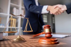 Personal Injury Lawyer hand shake with client