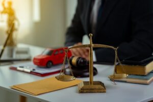 Car Accident Lawyer working in his office