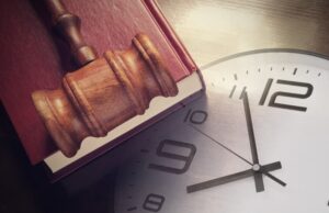 Clock, Gavel and Book - A concept of legal timeline